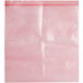 A pink plastic bag with a red zipper.