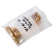 A Choice clear polyethylene bag with white block containing gold bolts.