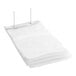 A stack of clear rectangular LDPE bread bags on a wicket dispenser.
