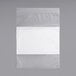 A clear plastic bag with a white strip for labeling.