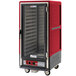 A red and black Metro C5 heated holding cabinet with a glass door.