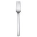 A silver Oneida Noval table fork with a long handle.