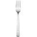 A silver fork with a white handle.