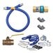 A blue flexible gas hose and fittings kit with various parts.