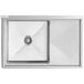 A close-up of a Regency stainless steel commercial sink with a right drainboard.