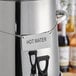 A silver Choice Coffee Chafer Urn with a "Hot Water" label on it.