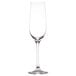 A close-up of a clear Stolzle flute wine glass with a long stem.