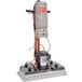 A Square Scrub machine with a red and black cylinder attached to a white HEPA dry vac.