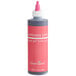 a close up of a pink bottle