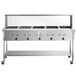 An Avantco stainless steel electric steam table with an undershelf and sneeze guard.