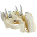 A white plastic Bunn compressor relay with metal parts.