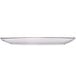 A white International Tableware rectangular porcelain platter with a silver rim.