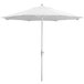 A white Lancaster Table & Seating umbrella with a pole.