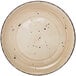 A close up of a white International Tableware Rotana porcelain plate with a wheat design.