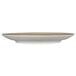 An International Tableware wheat coupe porcelain plate with a brown rim.