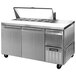 A Continental Refrigerator stainless steel sandwich prep table with two doors and a lid.