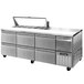 A Continental Refrigerator stainless steel sandwich prep table with drawers.