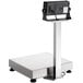 An AvaWeigh receiving scale with a tablet on top of it.