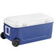 A blue and white Choice cooler with wheels.