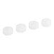 A row of white round plastic caps with a black circle on top.