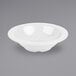 A white GET Diamond White melamine bowl.