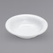 a white bowl on a gray background