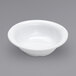 a white bowl on a gray background