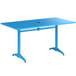 A blue Lancaster Table & Seating aluminum dining table with a black umbrella hole.