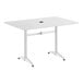 A rectangular white powder-coated aluminum outdoor dining table with an umbrella hole in the center.