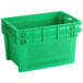 a green plastic container with holes