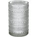 A Fortessa smoke gray beverage glass with a textured design.
