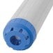 A blue and white cylindrical water filter with a hole in the middle.
