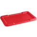 a red rectangular tray with a white background