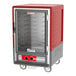 A red Metro C5 heated holding cabinet with a clear door.