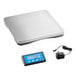 A white digital pizza scale with a blue and black wireless display.