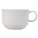 A close-up of a CAC Bone White china tea cup with a handle.