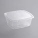 A 64 oz. clear PET hinged container with a lid.