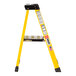 A yellow Bauer 4' fiberglass platform ladder with black and white labels.