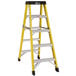 A yellow ladder with black accents.