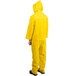 A person wearing a yellow Cordova StormFront rainsuit.