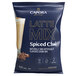 A white bag of Capora Spiced Chai Latte Mix with a picture of a drink on the front.