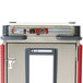 A red Metro T Series holding cabinet with a red door and handle.
