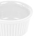 A CAC white china fluted ramekin with a white round rim.