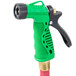 A green and black Notrax insulated spray nozzle.