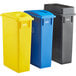 A Lavex 3-stream recycle station with blue, yellow, and black trash cans and lids.