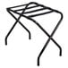 A Lancaster Table & Seating black metal folding luggage rack.