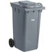 A Lavex gray rectangular wheeled trash can with a lid.