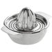 A close-up of a stainless steel citrus juicer with a squeezer.