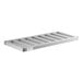 A white metal bottom shelf with four compartments for a Regency Keg Rack.