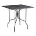 A Lancaster Table & Seating Harbor Black square outdoor table with ornate legs.